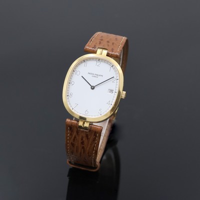 PATEK PHILIPPE Ellipse Armbanduhr in GG 750/000 Referenz 3930, Schweiz um 1990, quarz, 2-tlg. Geh., Boden aufgedr., orig. Lederband m. orig. GG ...