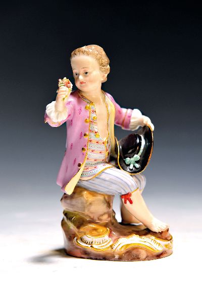 Porzellanfigur, Meissen, um 1850-1924, Gärtnerkind/ kl. Kavalier mit Blumen, Modellnr. 17, polychrom bemalt, Goldstaffage, H. ca. 12.5 cm, l. rest., ...