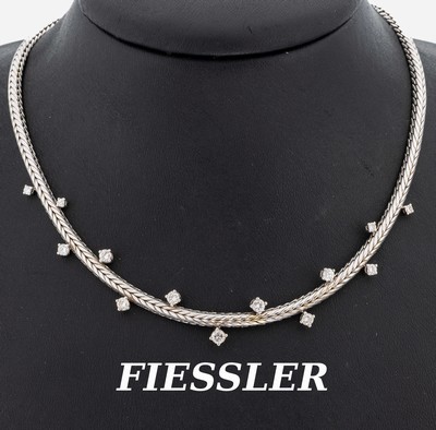 18 kt Gold FIESSLER Brillant-Collier, WG 750/000, 13 Brillanten im Verlauf zus. ca. 1.0ct Weiß/si, L. ca. 42 cm, Kastenschloss mit 2 ...