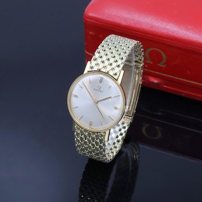 OMEGA Herrenarmbanduhr in GG 585/000 Referenz 14756SC-61, Schweiz um 1963, Handaufzug, Boden aufgedr., orig. Goldband m. Faltschl., orig. Krone u. ...