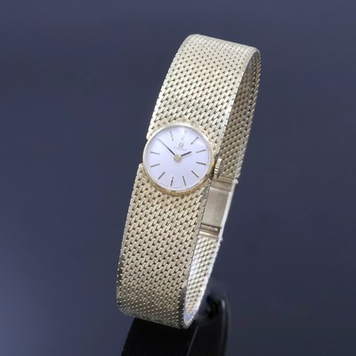 TISSOT Damenarmbanduhr in GG 585/000, Schweiz 1960 Jahre, Handaufzug, 2-teil. Geh., Boden aufgedr., Milanaiseband, Anz. v. Std. und Min., Kal. 709-1, ...