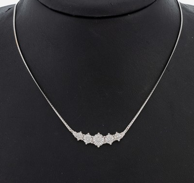 18 kt Gold Brillant-Collier, WG 750/000 gepr., Mittelteil aus 5 runden Elementen, 35 Brillanten zus. ca. 0.60 ct Weiß/si-p, L. ca. 42.5 cm, ...