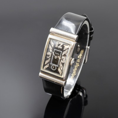 BULOVA seltene Cocktailwatch, USA um 1940, Handaufzug, 2-teil. Palladium-geh. m. verd. Bandanstößen, Boden aufgedr., schwarzes Zifferblatt m. in WG ...