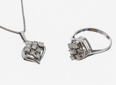 14 kt Gold Diamant-Schmuckset, WG 585/000, best. aus: Ring, RW 55, und 1 Anhänger, an Kette, 925er Silber, L. ca. 43.5 cm, insg. 18 Brillanten und ...