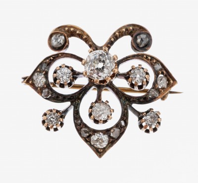 18 kt Gold Diamant-Brosche, um 1890, RG 750/000, Darstellung einer stil. Lilie, 19 Altschliffdiamanten und Diamantrosen zus. ca. 0.60 ct ...