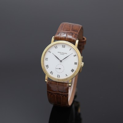 PATEK PHILIPPE Calatrava Armbanduhr in GG 750/000 Referenz 3919, Handaufzug, Schweiz um 1990, 2-tlg. Geh., Lünette mit Clous-de- Paris Verzierung ...