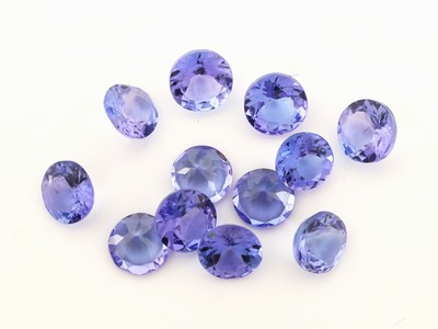 12 lose Tansanite, zus. ca. 5.90 ct, rundfacett.