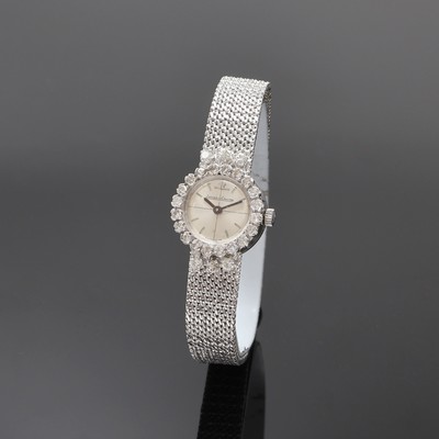 Damenarmbanduhr in WG 750/000 mit Diamantlünette bezeichnet Jaeger-LeCoultre, quarz, neutr. Geh. um 1960, Werk und Zifferblatt getauscht, Boden ...