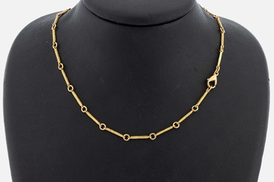 18 kt Gold Collier, GG 750/000, strukt. Stäbchen, L. ca. 43 cm, Karabinerschließe, ca.12.4 g