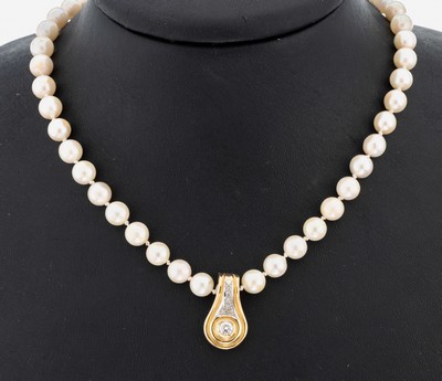 14 kt Gold Brillant-Clipanhänger, GG/WG 585/000, in WG gefasster Brillant ca. 0.20 ct feines Weiß/si, 6 Brillanten zus. 0.04 ct Weiß/si, an ...