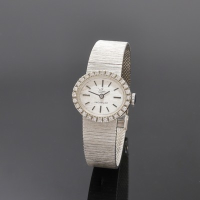 STOWA Damenarmbanduhr in WG 750/000 mit Diamanten, Deutschland/Schweiz um 1965, Handaufzug, Goldband, Boden aufgedr., Lünette aufw. m. Diamanten ...