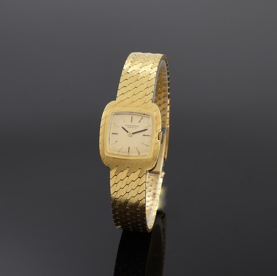 IWC Damenarmbanduhr in GG 750/000, Schweiz um 1965, Handaufzug, orig. Goldband, Boden aufgedr., champagnerfarb. Zifferbl. m. aufges. Std.-Ind., ...