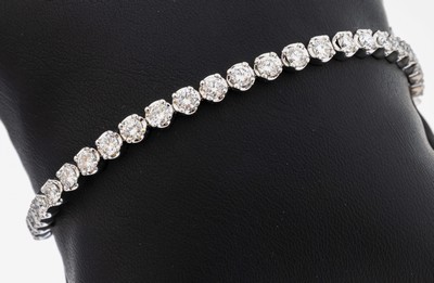 14 kt Gold Brillant-Linienarmband, WG 585/000, 42 Brillanten zus. ca. 5.20 ct feinesWeiß-Weiß/vs-si, L. ca. 18.5 cm, Kastenschlossmit 2 ...