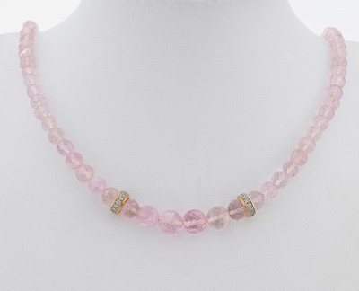 Morganit-Collier mit 18 kt Gold Schließe und Brillant-Zwischengliedern, GG 750/000, facett. Morganit-Kugeln zus. ca. 100.0 ct, 2 Zwischenglieder ...