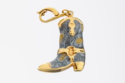 18 kt Gold Clipanhänger, GG 750/000, Darstellung eines Stiefels, part. mit grauem und gelbem Hartlack, L. ca. 4 cm, ca. 5.8 g