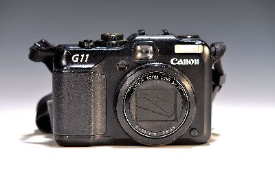 Canon Powershot G11, nach 2009, mit Blitz, Fest verbautes Objektiv 1:2.8-4.5 6.1-30.5mm, mit Akku ohne Zubehör. Dazu Canon Speedlite 550EX.