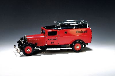 Märklin Metall Reichspostwagen 1989, Bj. um 1994, No. 46994, Sonderserie, Blechgehäuse, schwarz/rot, Uhrwerkmotor mit Schlüssel, mit Blechkiste ...