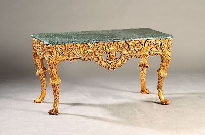 Tisch mit Marmorplatte, 2.H. 20.Jh., in gold gefaßt aufwendige Schnitzereien ca. 60x110x56 cm, EZ 2