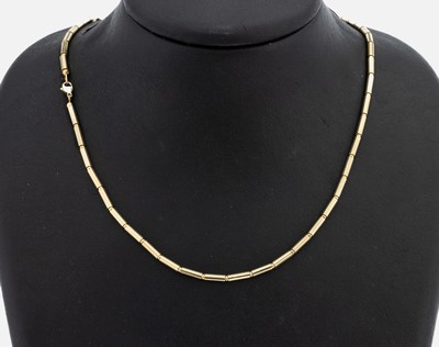 14 kt Gold Collier, GG 585/000, längliche und kugelförmige Glieder auf Seidenkordel, L. ca. 47 cm, Karabinerschließe, ca. 16.1 g