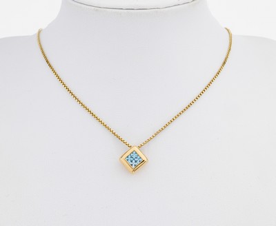 14 kt Gold Topas-Anhänger, GG 585/000, 4 Blautopas-Carrees (beh.), an Kette, GG 585/000, L. ca. 42.5 bzw. 45.5 cm, Federringschließe, ca. 8.0 g