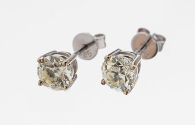Paar 14 kt Gold Diamant-Ohrstecker, WG 585/000, 2 Altschliffdiamanten zus. ca. 1.34 ct Getönt-light Yellow/si