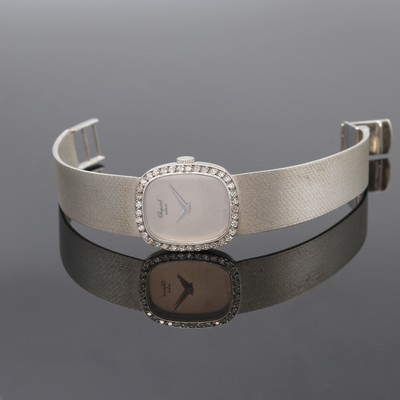 CHOPARD Damenarmbanduhr in WG 750/000 mit Diamanten Referenz 5092 1, Schweiz um 1970, Handaufzug, orig. Goldband, Boden aufgedr., Lünette aufw. m. ...