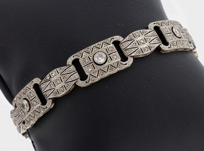 18 kt Gold Art Deco Diamant-Armband, um 1930, WG 750/000, Millegriffverzierung, Durchbrucharbeit, 6 Altschliffdiamanten zus. ca. 0.95 ct ...