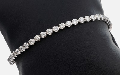 14 kt Gold Brillant-Linienarmband, WG 585/000, Brillanten zus. ca. 4.80 ct feines Weiß-l.get.Weiß/vs-si, L. ca. 18.5 cm, Kastenschloss mit 2 ...
