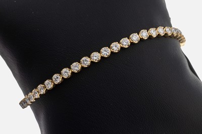 14 kt Gold Brillant-Linienarmband, GG 585/000, Brillanten zus. ca. 4.26 ct feines Weiß-Weiß/si-p, L. ca. 18.5 cm, Kastenschloss mit 2 ...