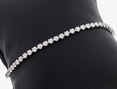 14 kt Gold Brillant-Linienarmband, WG 585/000, Brillanten zus. ca. 2.95 ct (grav.) feines Weiß-l.get.Weiß/vs-si, L. ca. 17.5 cm, Kastenschloss mit ...