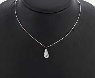 14 kt Gold Brillant-Anhänger, WG 585/000, Brillant ca. 1.17 ct Weiß/p, 3 Brillanten zus.ca. 0.10 ct Weiß/si, an Kette, WG 585/000, L. ca. 49 cm, ...