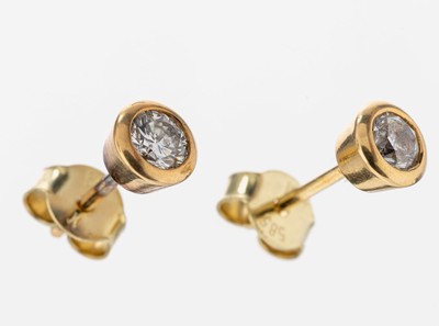 Paar 14 kt Gold Brillant-Ohrstecker, GG 585/000, 2 Brillanten zus. ca. 0.70 ct Weiß/si-p, ca. 1.9 g