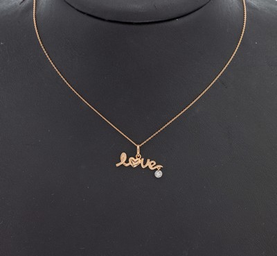 14 kt Gold Brillant-Anhänger, "Love", RG 585/000, Brillant ca. 0.13 ct feines Weiß/si, an Kette, L. ca. 40 cm, Karabinerschließe, ...