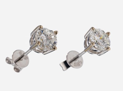 Paar 14 kt Gold Brillant-Ohrstecker, WG 585/000, 2 Brillanten zus. ca. 1.00 ct Weiß-l.get.Weiß/vs-si