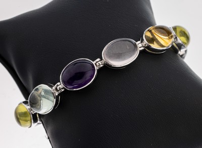 Farbstein-Armband, 925er Silber, ovalen Topas-(beh.), Citrin-, Peridot- und Amethystcabochons, L. ca. 19.5 cm, Kastenschloss mit 2 ...