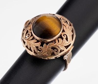 14 kt Gold Tigerauge-Ring, wohl Polen nach 1963, RoseG 583/000, hoch aufgebauter Ringkopf mit Tigeraugen-Cabochon, Millegriffverz., Umrandung, ...