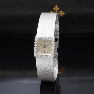 PATEK PHILIPPE feine und seltene Damenarmbanduhr in WG 750/000 Referenz 3364 1, Handaufzug, Schweiz um 1967, 2-teil. Geh., Milanaiseband, Lünette ...