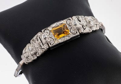 14 kt Gold Citrin-Diamant-Armband, WG 585/000 gepr., Mittelteil ehemals Art Deco Schmuckuhr, 1930er Jahre, durchbrochen gearbeitet, mittig Citrin im ...