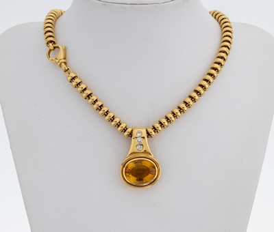 18 kt Gold Citrin-Diamant-Clipanhänger, GG 750/000, qualitätvolle Verarbeitung, ovalfacett. Citrin ca. 12.00 ct, 2 Brillanten zus. ca. 0.32 ct, 1 ...