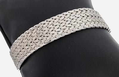 14 kt Gold Armband, WG 585/000, Oberfläche part. strukt., B. ca. 1.5 cm, L. ca. 18.5 cm, Kastenschloß mit doppelter Sicherheitsacht, ca. 44.2 g