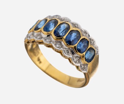 18 kt Gold Saphir-Brillant-Ring, GG/WG 750/000, 7 ovalfacett. Saphire zus. ca. 0.90 ct, 16 in WG gefasste Brillanten zus. ca. 0.08 ct Weiß/si-p, RW ...