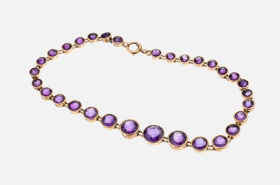 14 kt Gold Amethyst-Armband, um 1910-20, GG585/000 gepr., im Verlauf, rundfacett. Amethyste, L. ca. 20 cm, Federringschließe, ca. 10.1 g