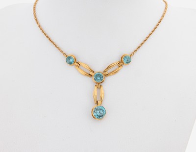 14 kt Gold Zirkon-Collier, GG 585/000, geometrisches Mittelteil, 4 rundfacett. blaue Zirkone, L. ca. 44 cm, Federringschließe, ca. 7.3 g