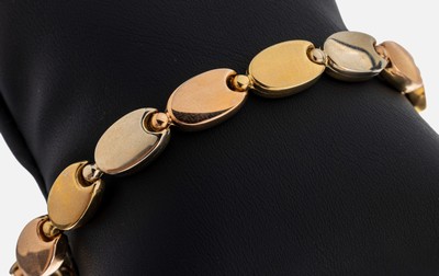 14 kt Gold Armband, GG/WG/RG 585/000, bohnenf. Glieder durch Kugelelemente verbunden, L. ca. 19 cm, Kastenschloss mit Sicherheitsacht, ca. 13 g