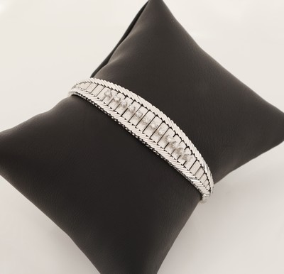 18 kt Gold Brillant-Armband, WG 750/000, z.T. sat. und pol., 12 Brillanten zus. ca. 0.36 ct Weiß/si, L. ca. 19 cm, Kastenschloss mit ...