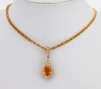 18 kt Gold Saphir-Brillant-Clipanhänger, GG750/000, mittig ovalfacett. orangefarb. Saphirca. 3.0 ct, 20 Brillanten zus. ca. 1.45 ct feines ...