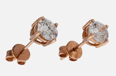 Paar 14 kt Gold Brillant-Ohrstecker, RG 585/000, 2 Brillanten zus. ca. 1.06 ct Weiß-l.get.Weiß/si-p