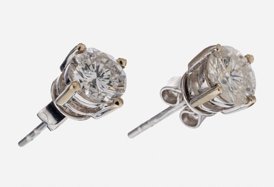 Paar 14 kt Gold Brillant-Ohrstecker, WG 585/000, 2 Brillanten zus. ca. 1.05 ct Weiß-l.get.Weiß/p