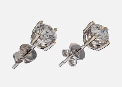Paar 14 kt Gold Brillant-Ohrstecker, WG 585/000, 2 Brillanten zus. ca. 1.01 ct feines Weiß-Weiß/vs-si