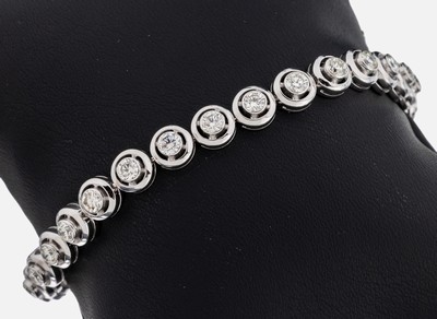 18 kt Gold Brillant-Armband, WG 750/000, 29Brillanten zus. ca. 5.0 ct Weiß-get.Weiß/vs- si, L. ca. 20 cm, Kastenschloss mit 2 Sicherheitsachten, ...